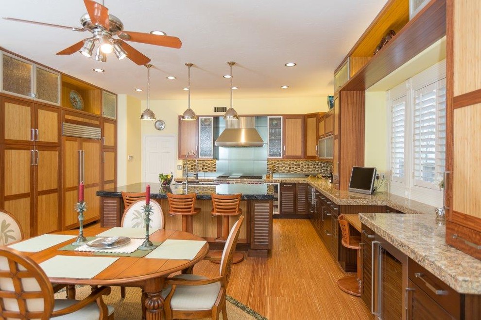 Large transitional u-shaped dark wood floor and brown floor eat-in kitchen photo in Orange County with an undermount sink, shaker cabinets, light wood cabinets, granite countertops, multicolored backsplash, matchstick tile backsplash, stainless steel appliances and an island