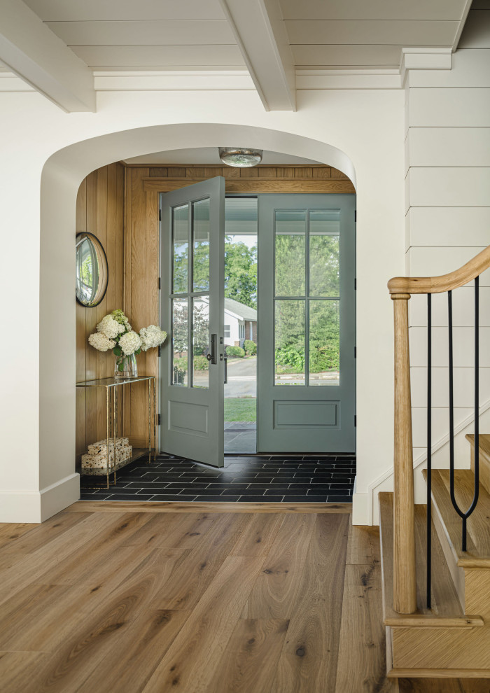 Example of a farmhouse entryway design in Charlotte