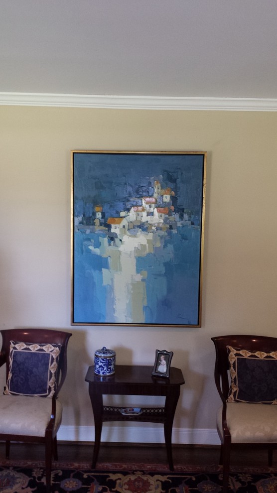 Example of a mid-sized transitional dark wood floor foyer design in Houston with beige walls