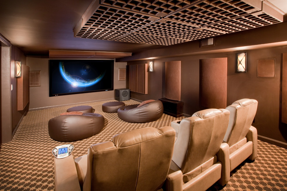 Photo of a mid-sized modern enclosed home theatre in Newark with brown walls, carpet, a wall-mounted tv and multi-coloured floor.