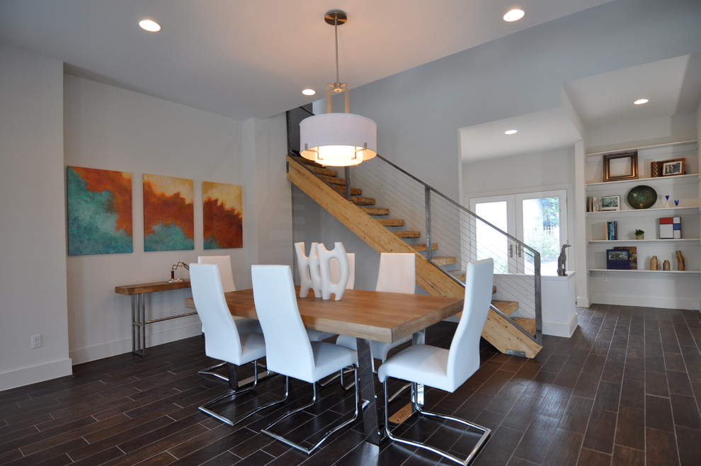 Inspiration for a large contemporary dining room in Austin with white walls.