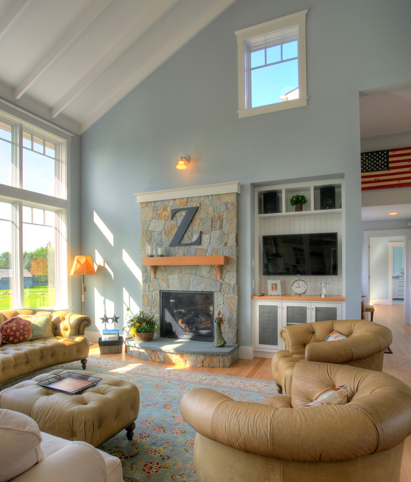 Inspiration for a traditional living room in Bridgeport with a stone fireplace surround.