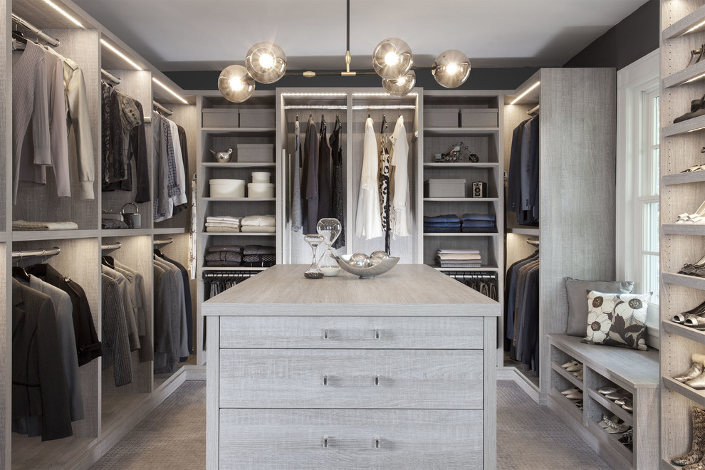 Photo of a large transitional storage and wardrobe in New York.