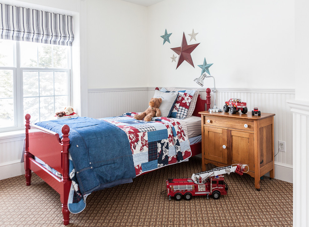 This is an example of a transitional kids' bedroom in Other with brown floor, white walls and carpet.