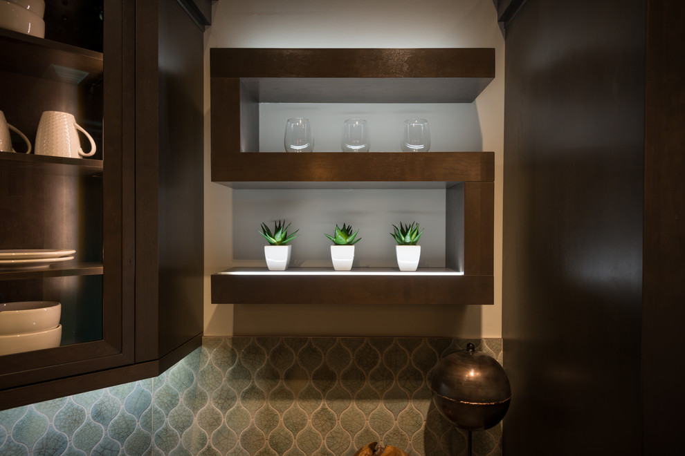 Kitchen - transitional kitchen idea in Phoenix with recessed-panel cabinets, dark wood cabinets, concrete countertops, blue backsplash, ceramic backsplash and stainless steel appliances
