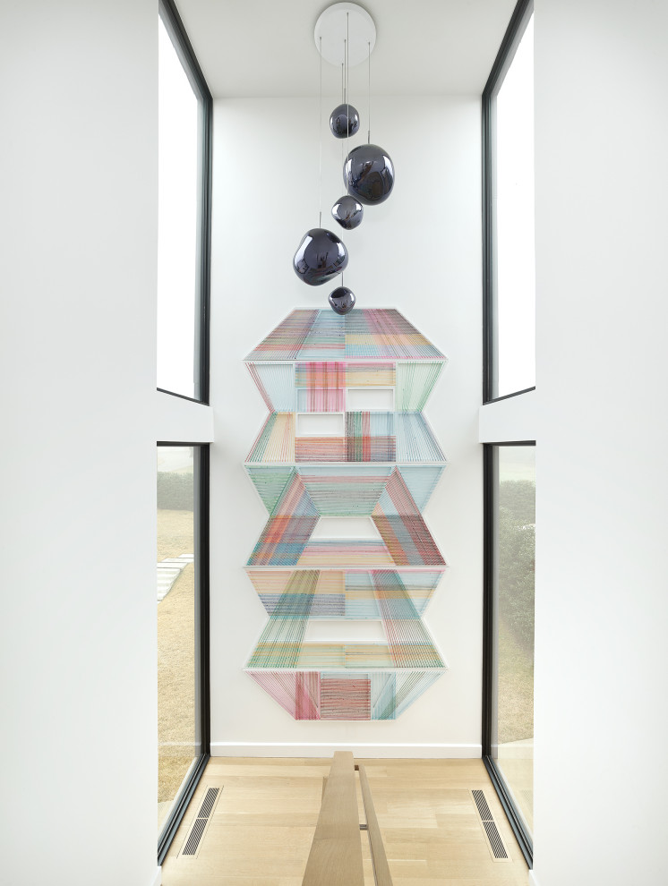 North Dallas - Inspiration for a mid-sized contemporary wooden u-shaped wood railing staircase remodel in Dallas with wooden risers