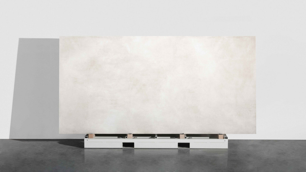 Large modern kitchen in Los Angeles with solid surface benchtops, beige splashback, beige floor and beige benchtop.