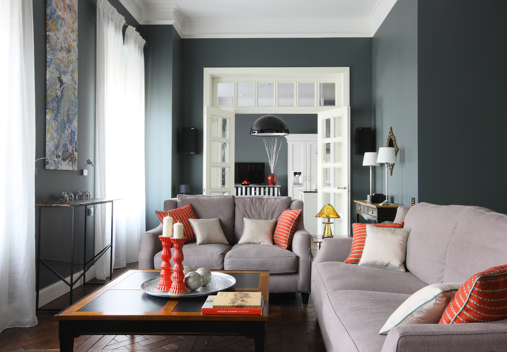 Photo of a contemporary formal enclosed living room in Moscow with grey walls and medium hardwood floors.