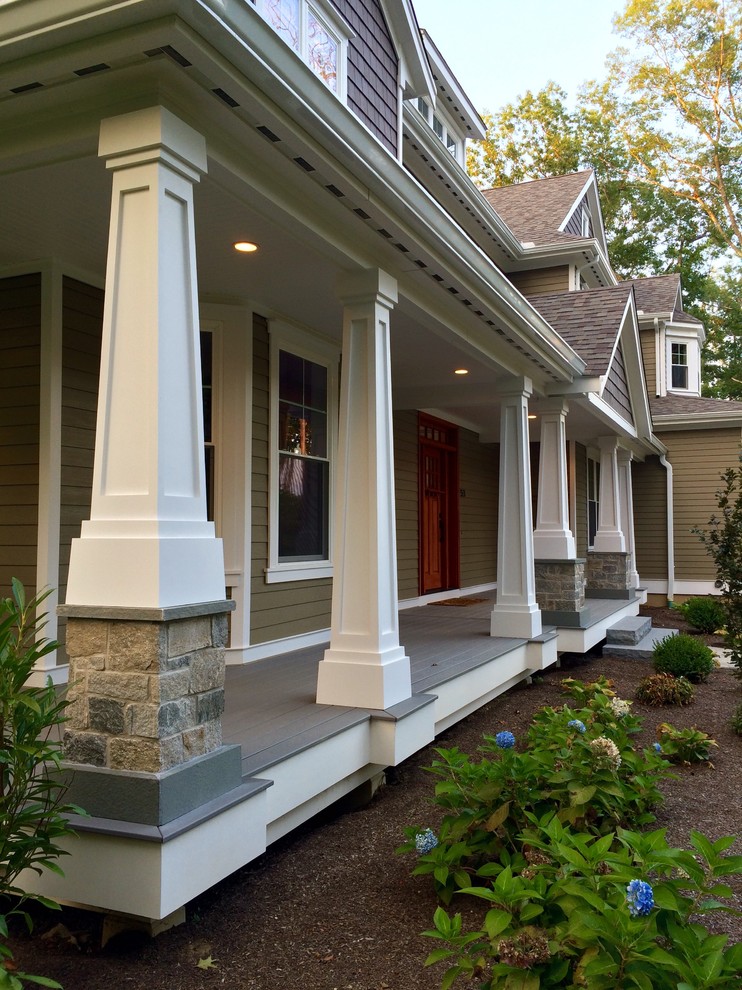 This is an example of a large arts and crafts front door in Bridgeport with beige walls, a single front door and a dark wood front door.