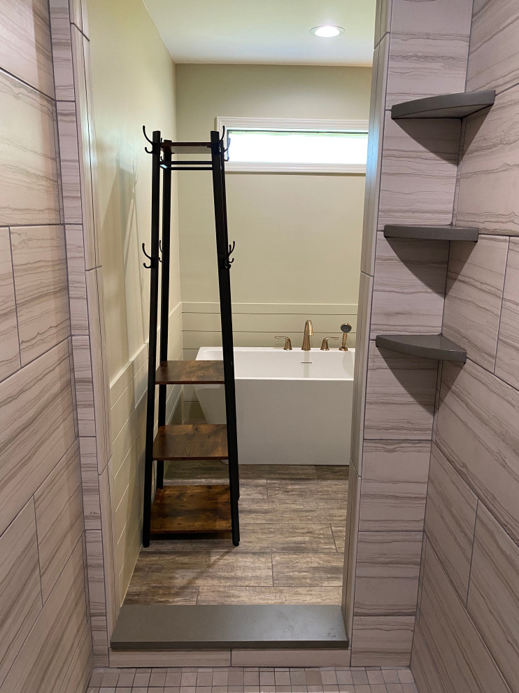 Photo of a mid-sized master bathroom in Other with raised-panel cabinets, black cabinets, a freestanding tub, an open shower, a two-piece toilet, beige tile, porcelain tile, porcelain floors, an undermount sink, engineered quartz benchtops, beige floor, an open shower, green benchtops, a double vanity and a built-in vanity.