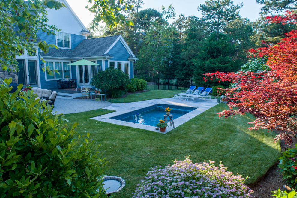 Inspiration for a small backyard rectangular pool in Boston with with a pool.