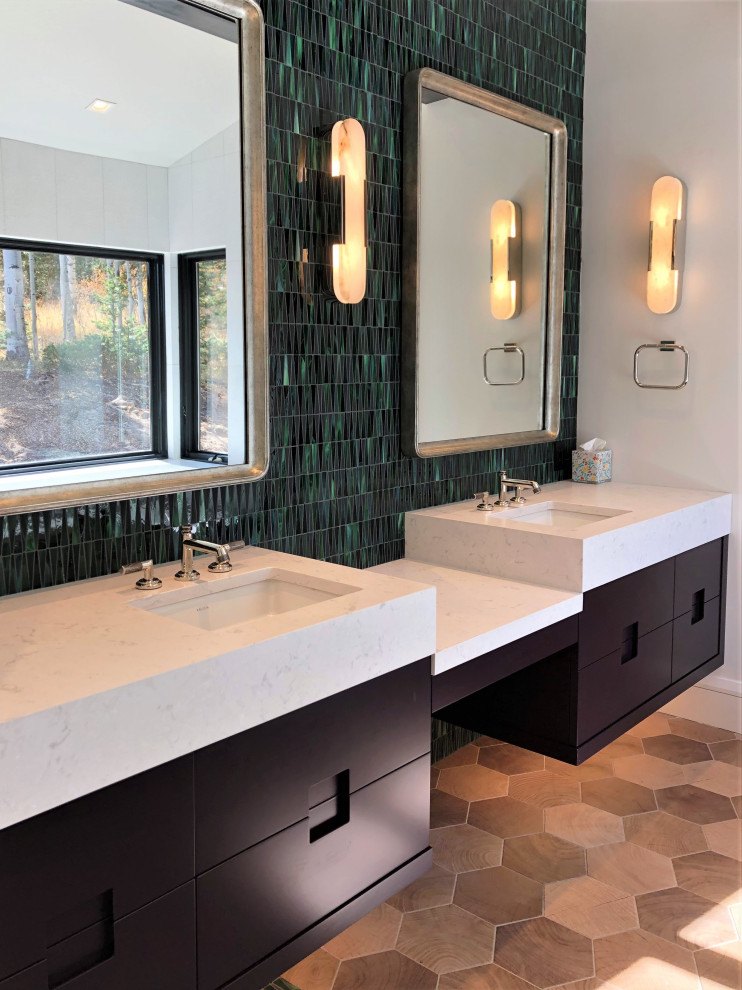 Inspiration for a mid-sized contemporary master wet room bathroom in Other with flat-panel cabinets, black cabinets, a freestanding tub, green tile, glass tile, white walls, wood-look tile, an undermount sink, brown floor, a hinged shower door, white benchtops, an enclosed toilet, a double vanity, a floating vanity and vaulted.