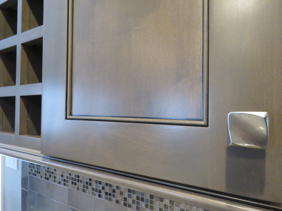 Mid-sized transitional u-shaped ceramic tile and beige floor eat-in kitchen photo in Philadelphia with an undermount sink, shaker cabinets, gray cabinets, quartzite countertops, gray backsplash, subway tile backsplash, stainless steel appliances and an island