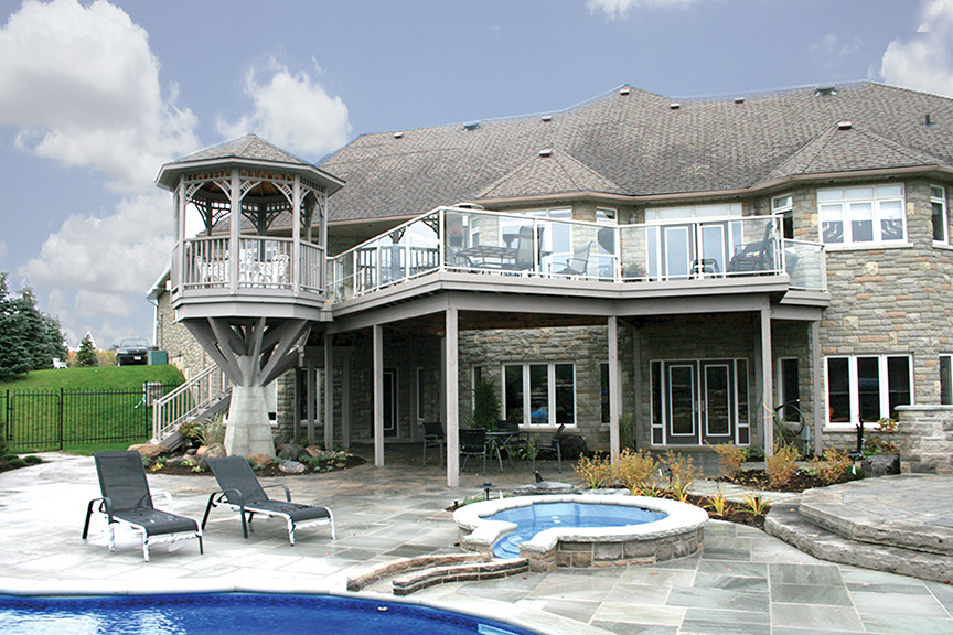 Minimalist backyard custom-shaped pool photo in Toronto