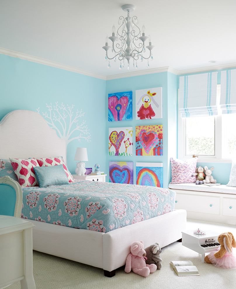 Design ideas for a traditional kids' bedroom for kids 4-10 years old and girls in Boston with blue walls, carpet and beige floor.