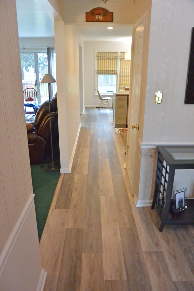 Example of a small transitional u-shaped vinyl floor and brown floor eat-in kitchen design in DC Metro with an undermount sink, shaker cabinets, gray cabinets, granite countertops, gray backsplash, mosaic tile backsplash, stainless steel appliances, a peninsula and gray countertops