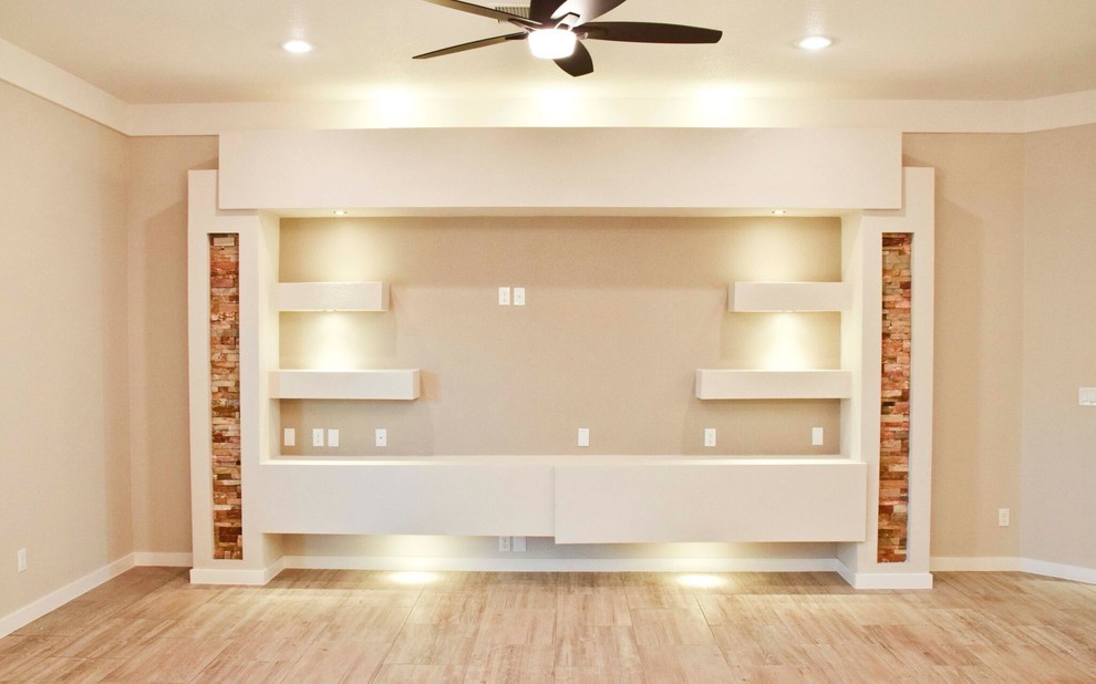 Inspiration for a mid-sized transitional open concept ceramic tile home design remodel in Austin with beige walls and a media wall