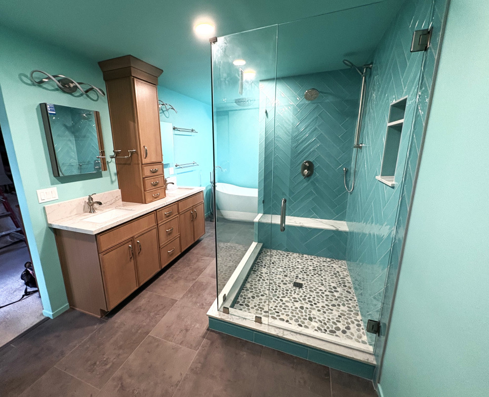 Freestanding bathtub - mid-sized transitional master green tile and ceramic tile vinyl floor, gray floor and double-sink freestanding bathtub idea with shaker cabinets, light wood cabinets, a bidet, green walls, an undermount sink, quartzite countertops, a hinged shower door, white countertops and a built-in vanity
