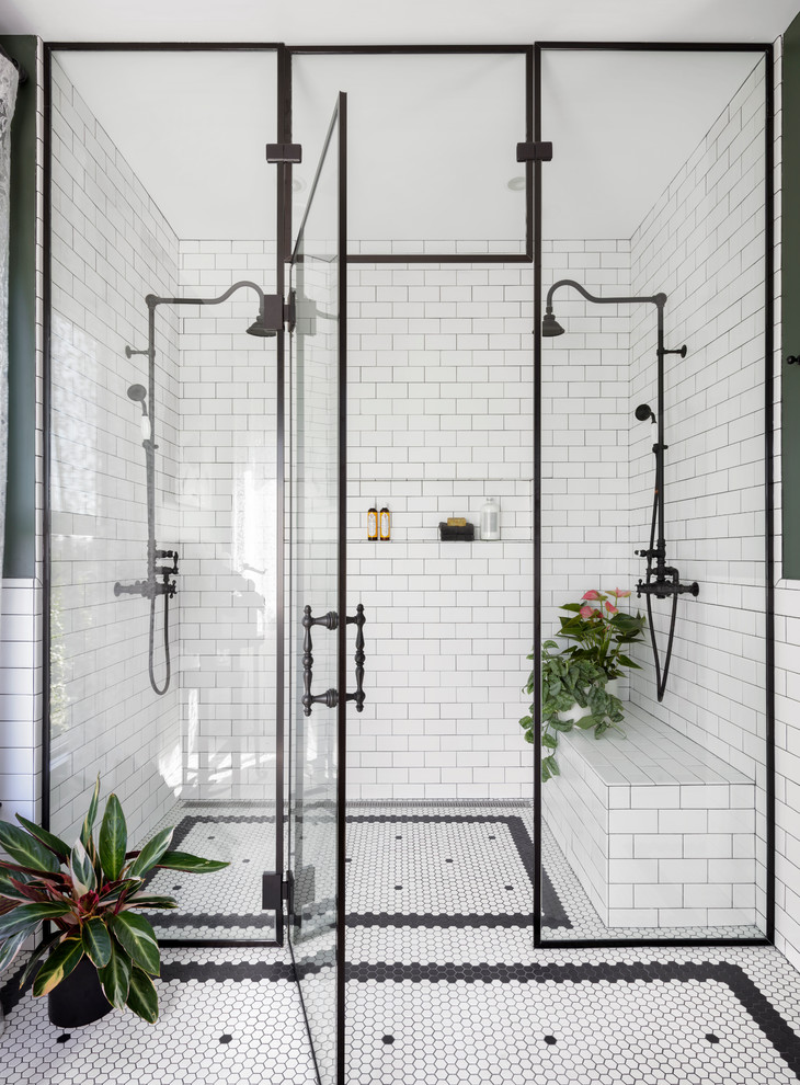 Large traditional master bathroom in Seattle with a curbless shower, white tile, ceramic tile, green walls, ceramic floors, white floor and a hinged shower door.