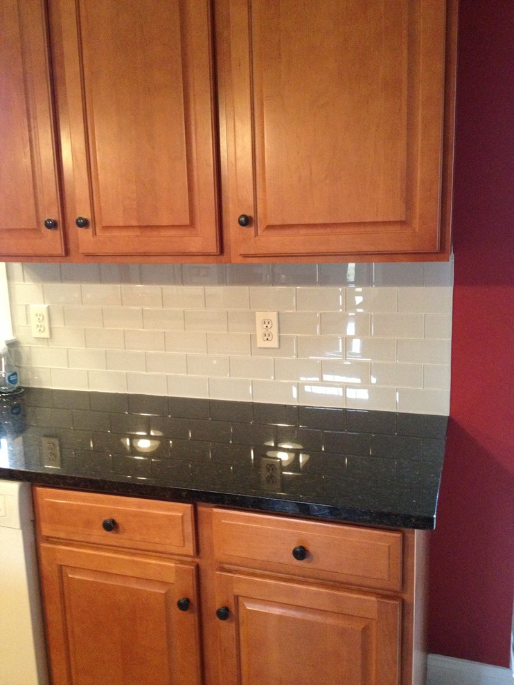New Granite Counter tops and Glass Subway Tiles...Now Paint