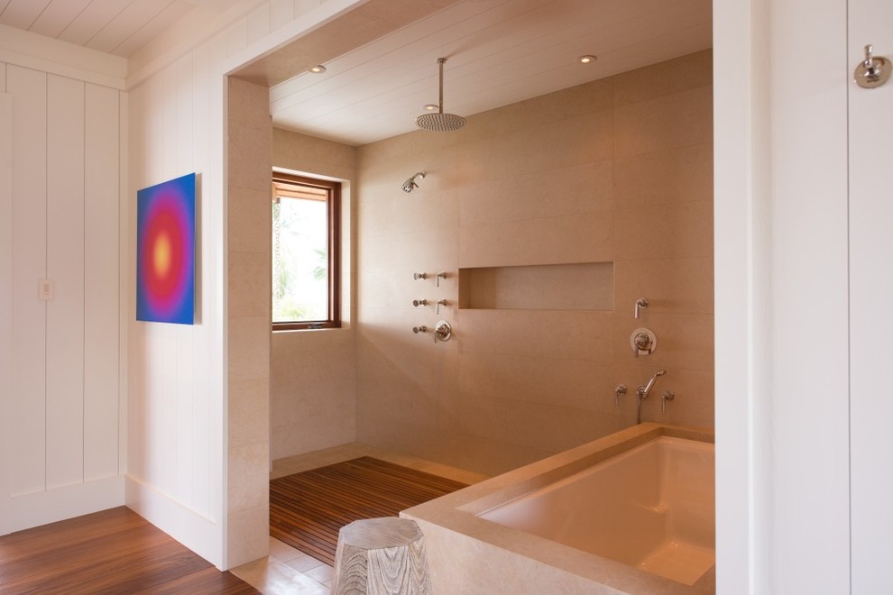 Design ideas for a large tropical master bathroom in Hawaii with flat-panel cabinets, medium wood cabinets, an undermount tub, an open shower, white walls, medium hardwood floors, an integrated sink and engineered quartz benchtops.