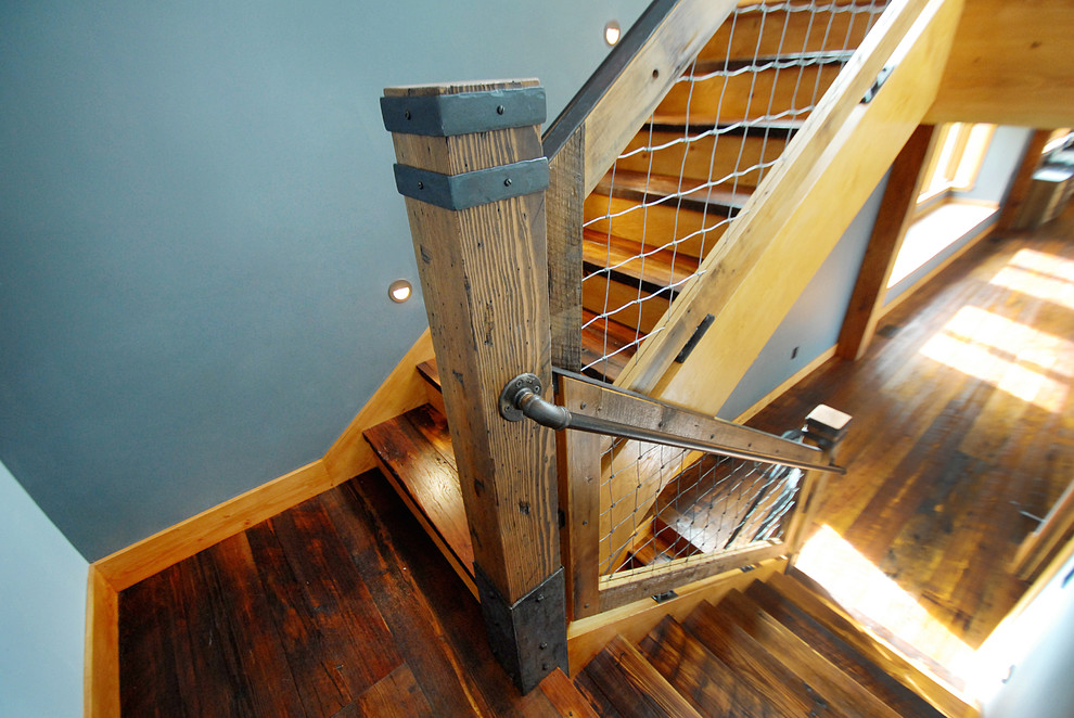 Small contemporary wood staircase in Burlington with wood risers.