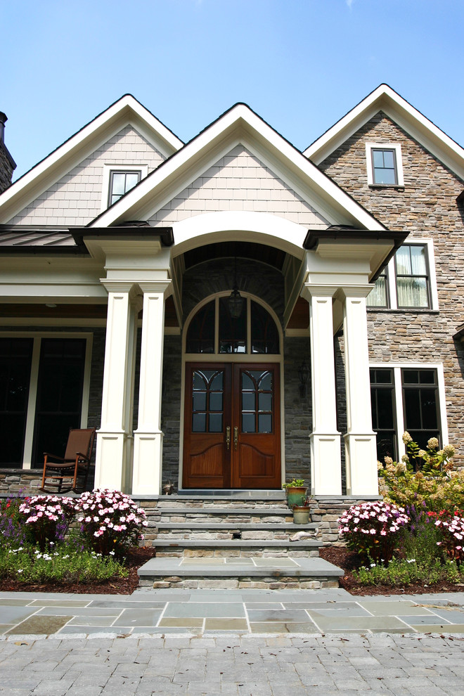 Design ideas for a traditional exterior in Raleigh with stone veneer.