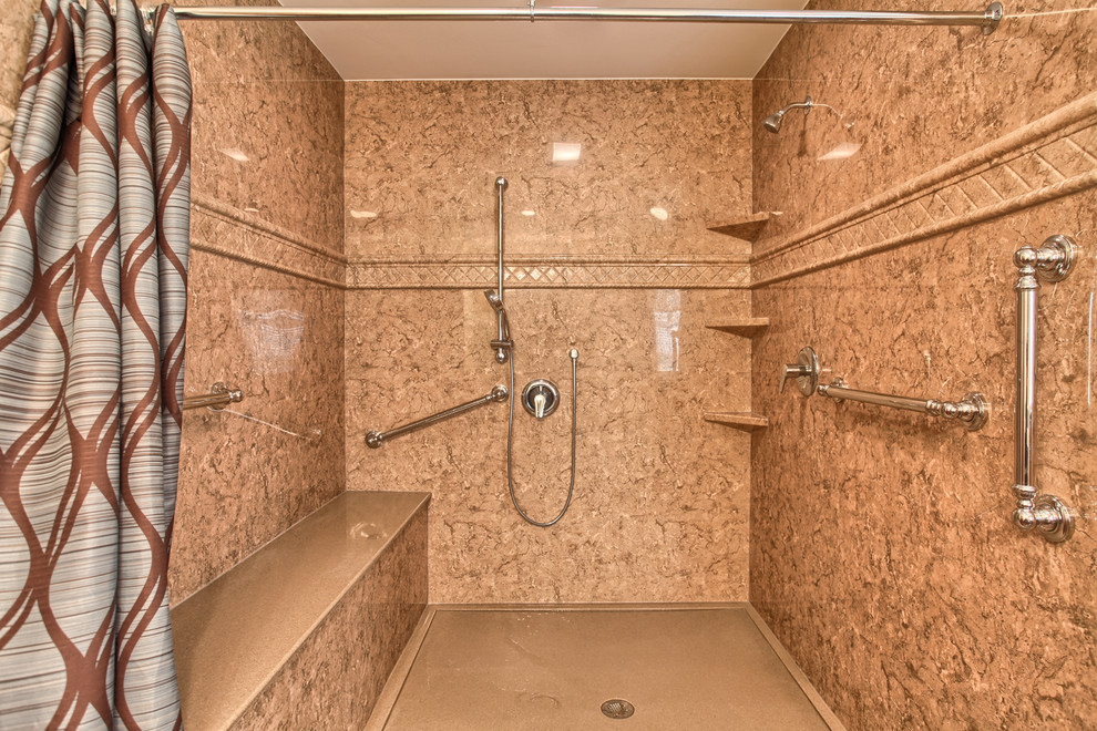 Photo of a large transitional bathroom in Other with a curbless shower and brown tile.