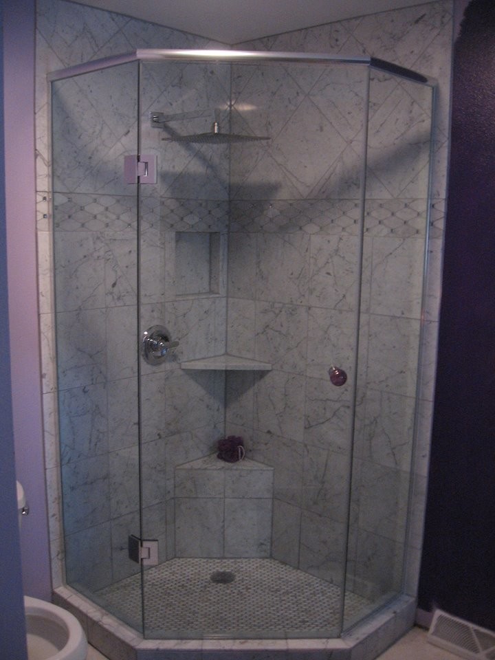 Ceramic tile corner shower photo with purple walls
