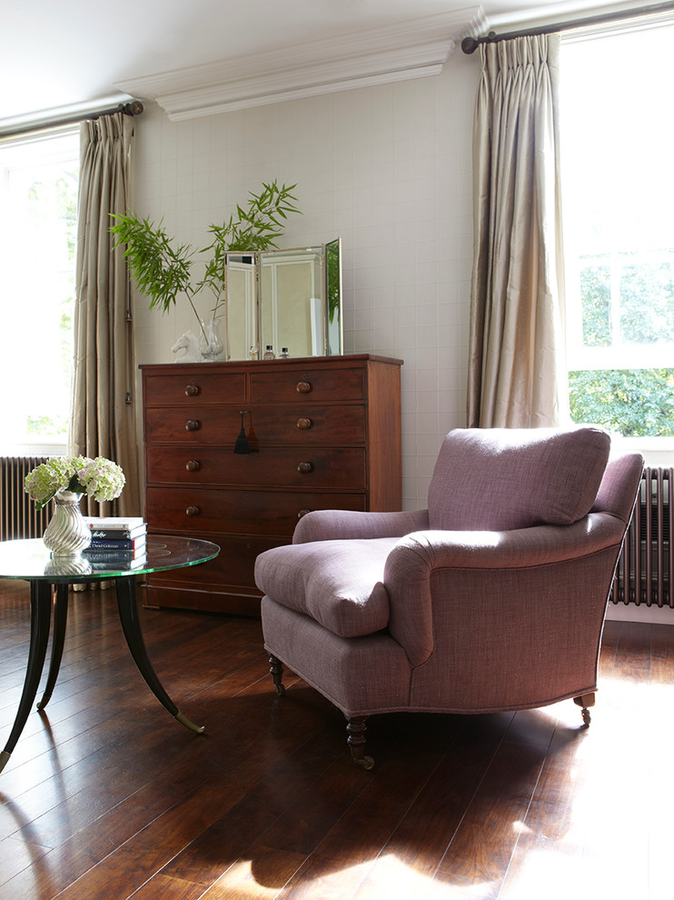 Inspiration for a traditional master bedroom in Sussex with grey walls and dark hardwood floors.