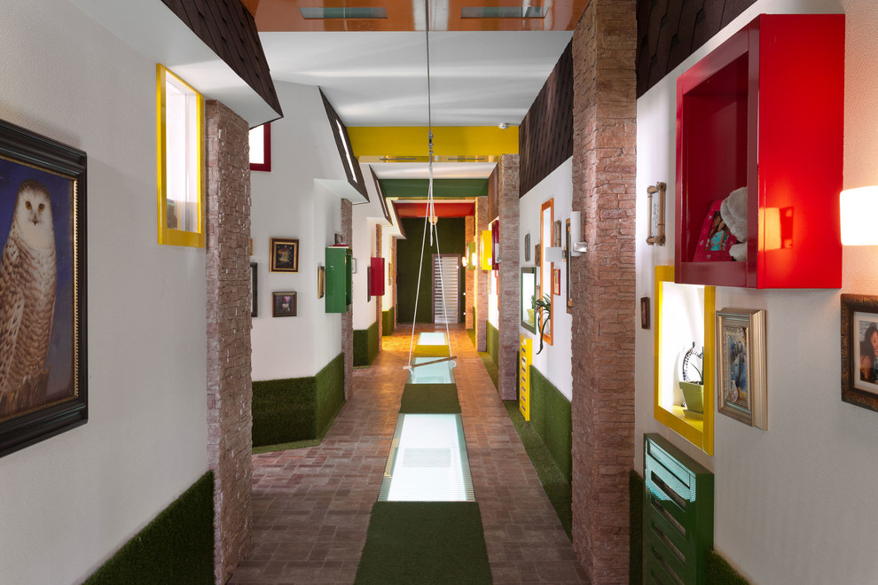 This is an example of an eclectic hallway in Other with white walls.