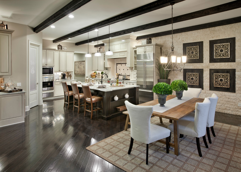 Photo of a transitional eat-in kitchen in Charlotte with white cabinets, beige splashback and stainless steel appliances.