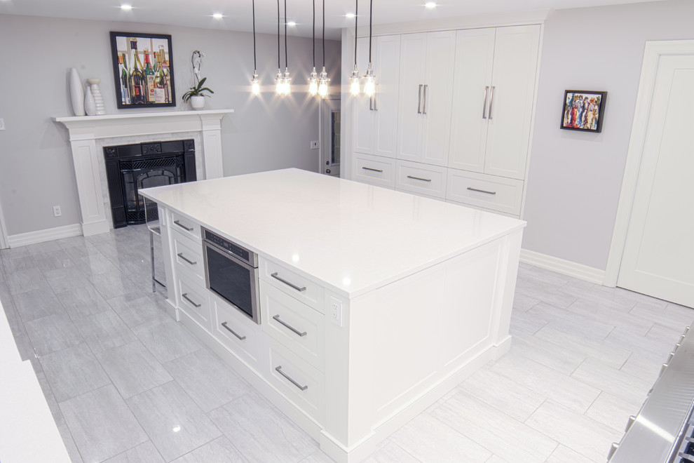 Example of a transitional kitchen design in Toronto