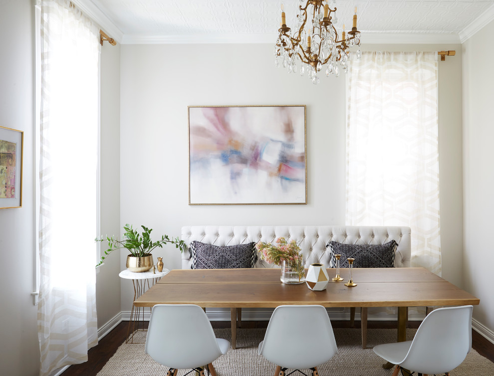 Example of a transitional dining room design in Chicago with beige walls