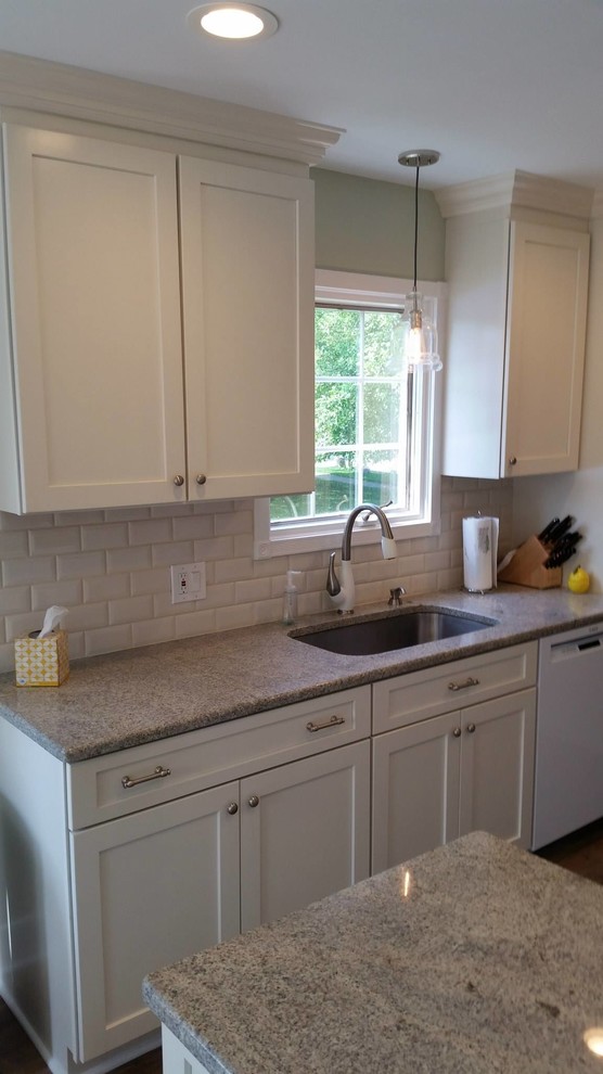 Example of a transitional dining room design in Detroit