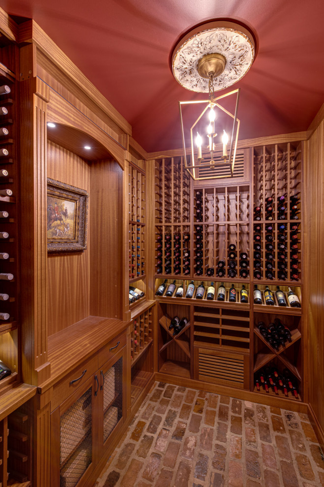 Secret passageway wine cellar. Basement layout with all mahogany racking.