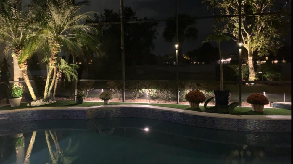Transitional pool photo in Orlando