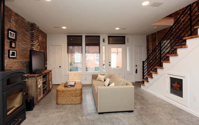 Urban Lofts rustic-living-room