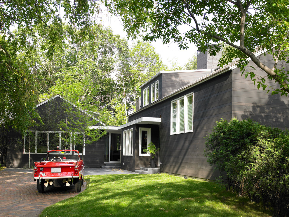Inspiration for a contemporary exterior in Minneapolis with wood siding.