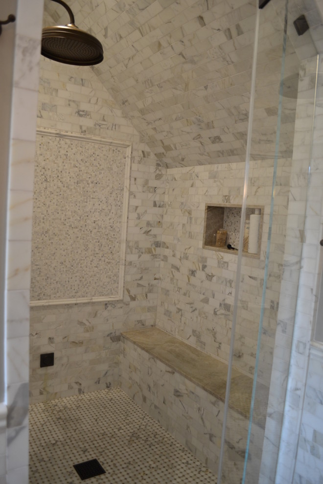 This is an example of a transitional master bathroom in San Francisco with an alcove shower, white tile, stone tile and mosaic tile floors.