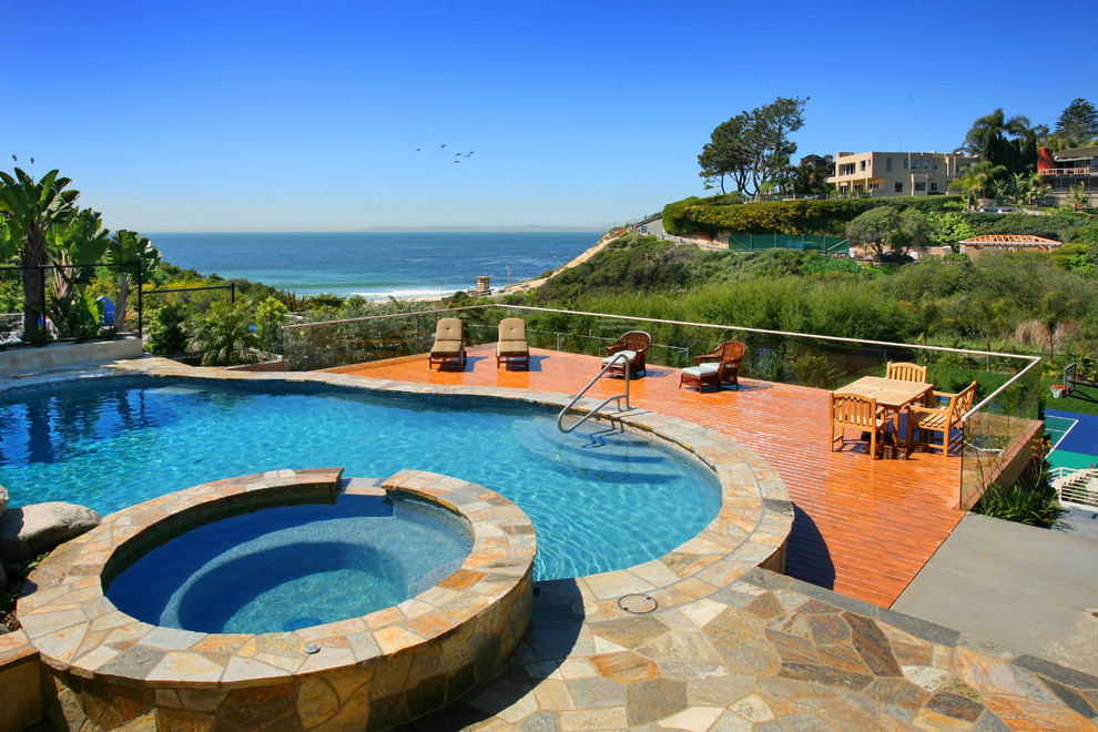 Inspiration for a contemporary custom-shaped pool in Orange County.