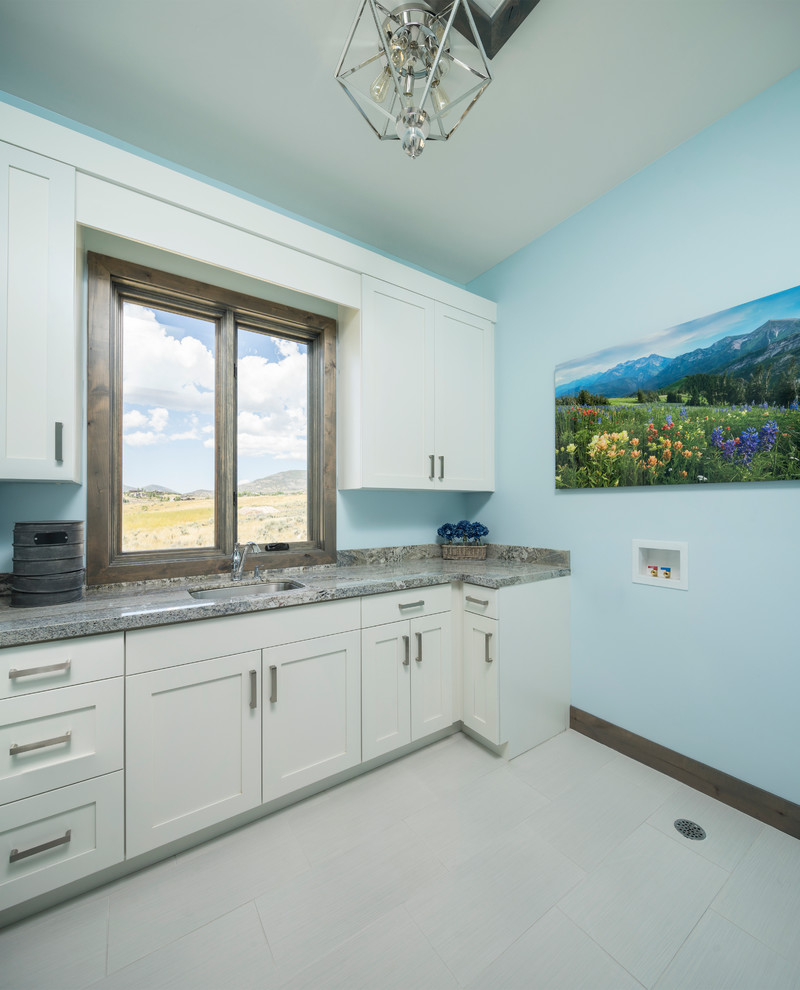This is an example of a transitional laundry room in Salt Lake City.