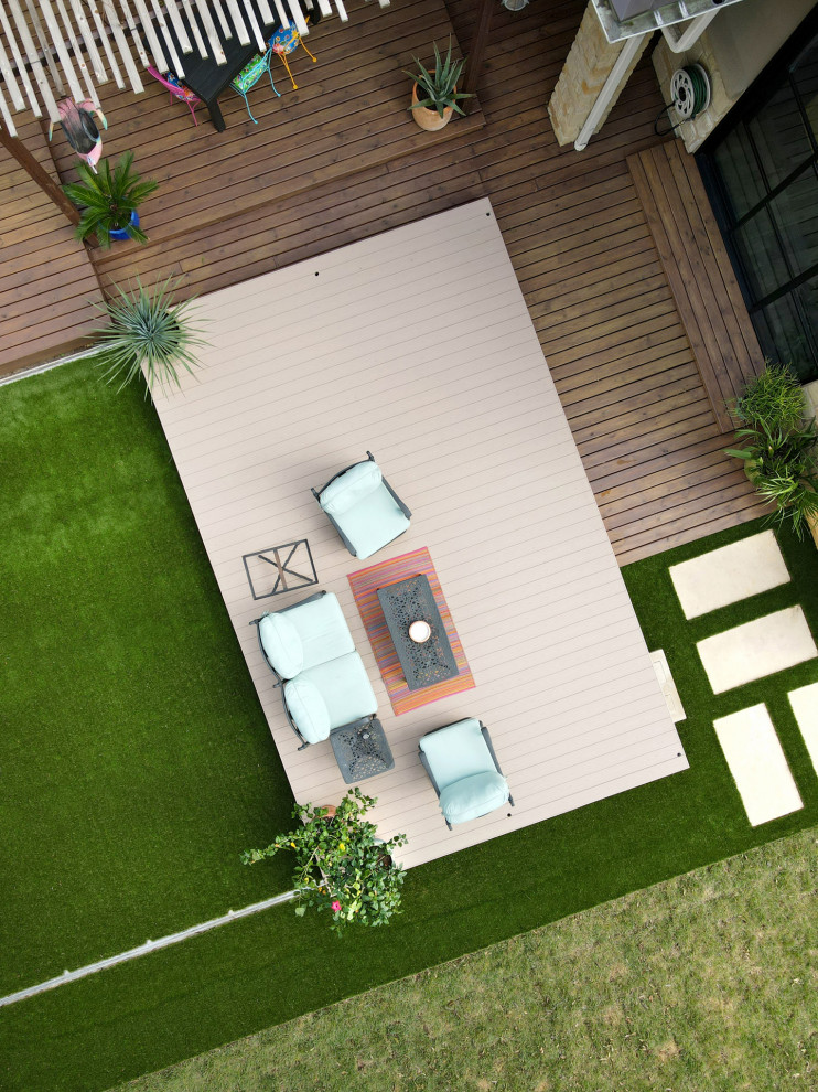 Inspiration for a small side yard deck remodel in Austin