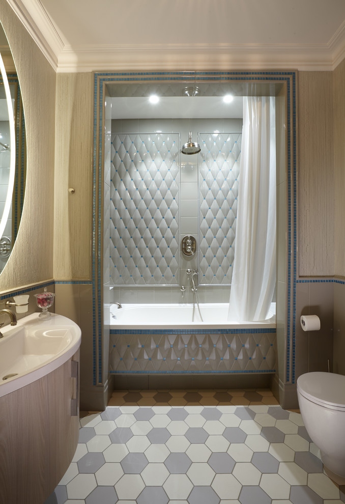 This is an example of a medium sized bathroom in Moscow with flat-panel cabinets, medium wood cabinets, a wall mounted toilet, grey tiles, ceramic tiles, grey walls, ceramic flooring, an integrated sink and solid surface worktops.