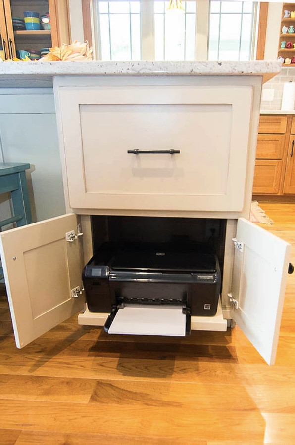 Inspiration for a mid-sized transitional l-shaped medium tone wood floor and brown floor open concept kitchen remodel with a farmhouse sink, shaker cabinets, medium tone wood cabinets, quartzite countertops, gray backsplash, subway tile backsplash, stainless steel appliances, an island and white countertops