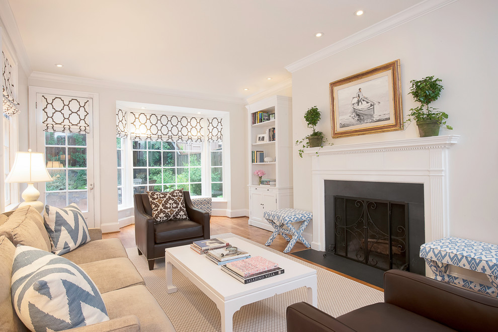 Photo of a transitional formal living room in DC Metro with a standard fireplace.