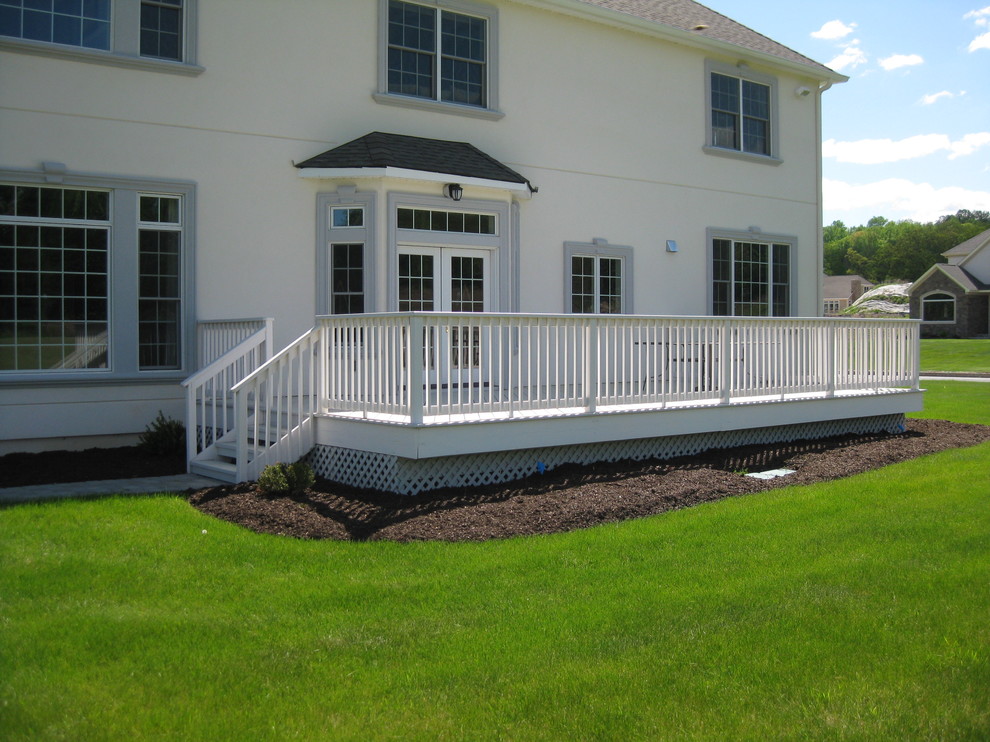 Beach style home design photo in New York