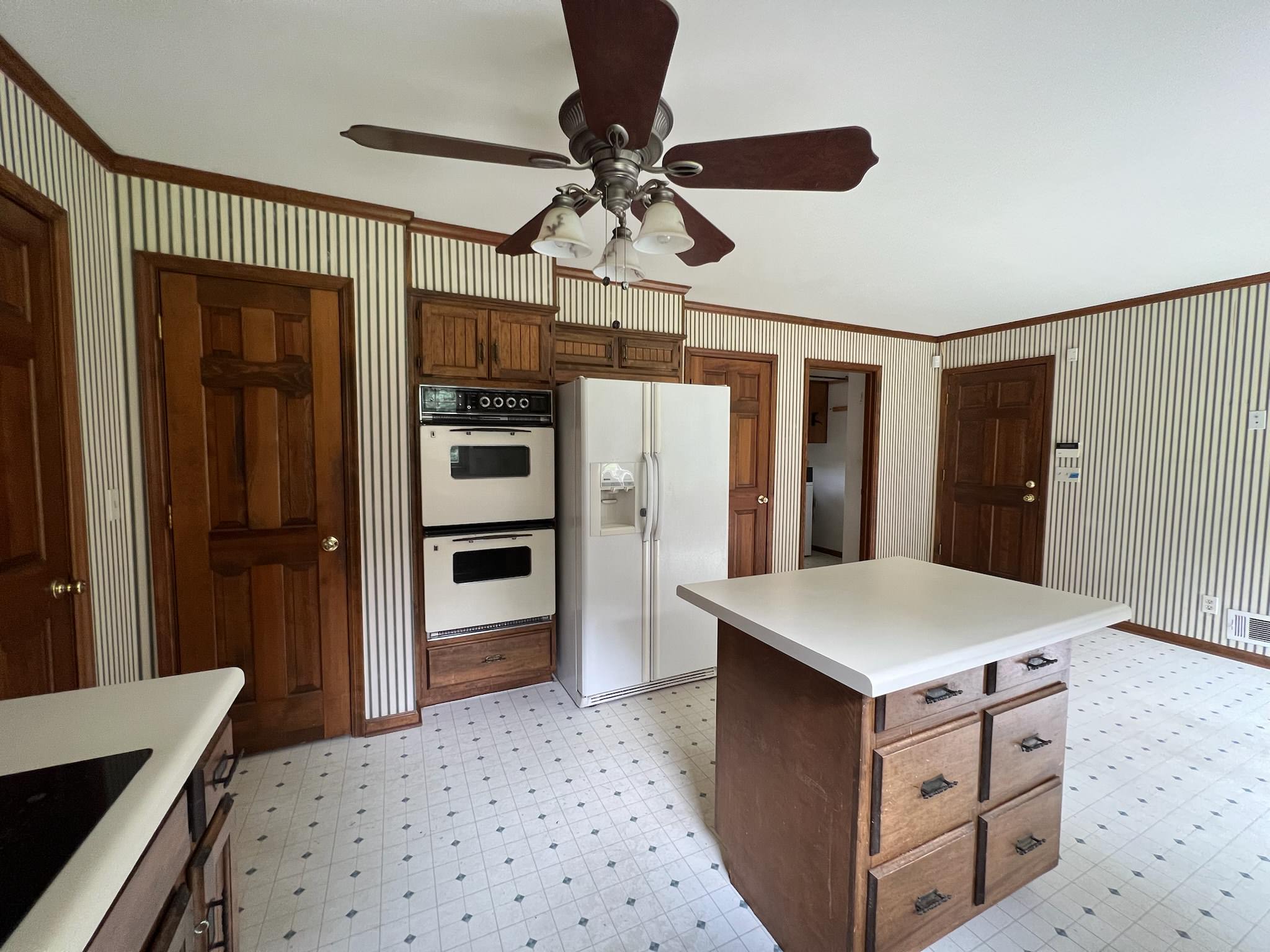 PEACHTREE CORNERS - White kitchen with Green island