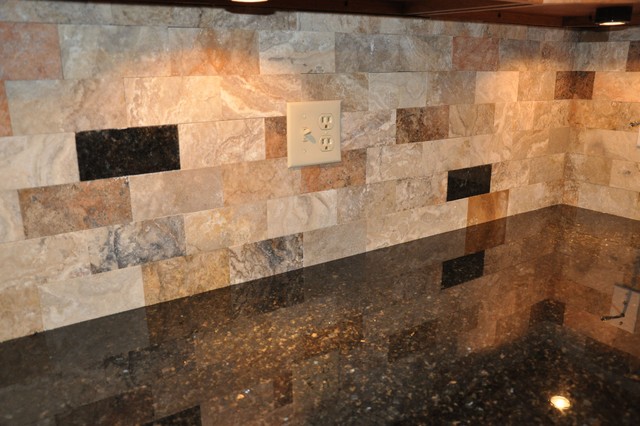 Granite Countertops And Tile Backsplash