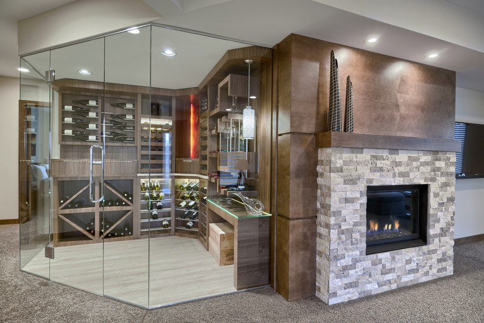 Photo of a mid-sized transitional wine cellar in Other with display racks, light hardwood floors and beige floor.
